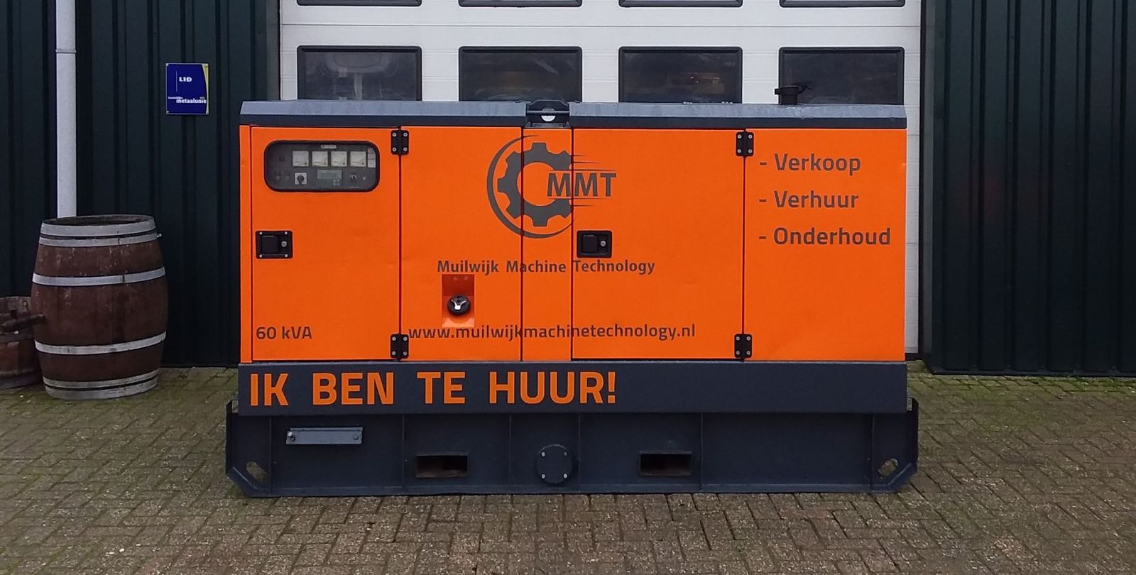 Oranje 60 kVA huuraggregaat van Muilwijk voor de werkplaats in Hoogblokland